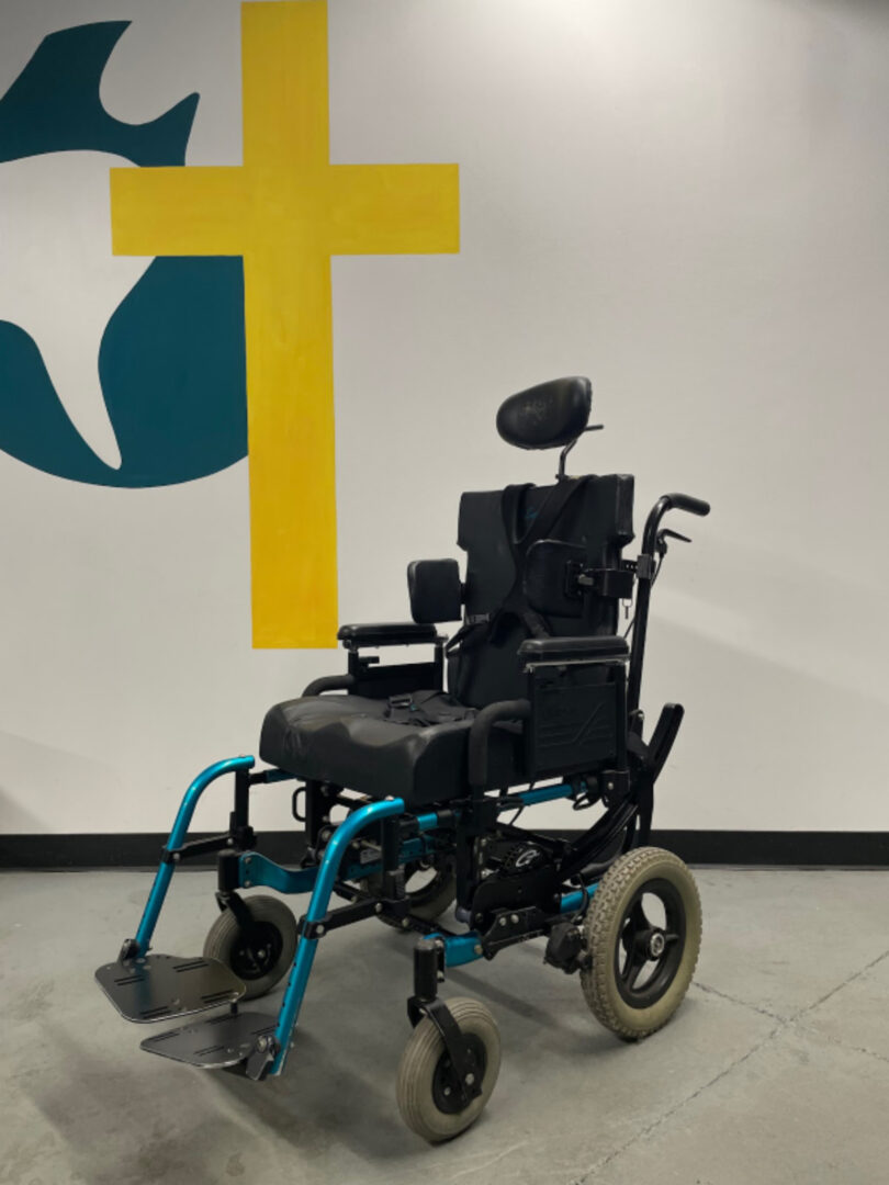 The Left View of a Wheel Chair in Black Color Image